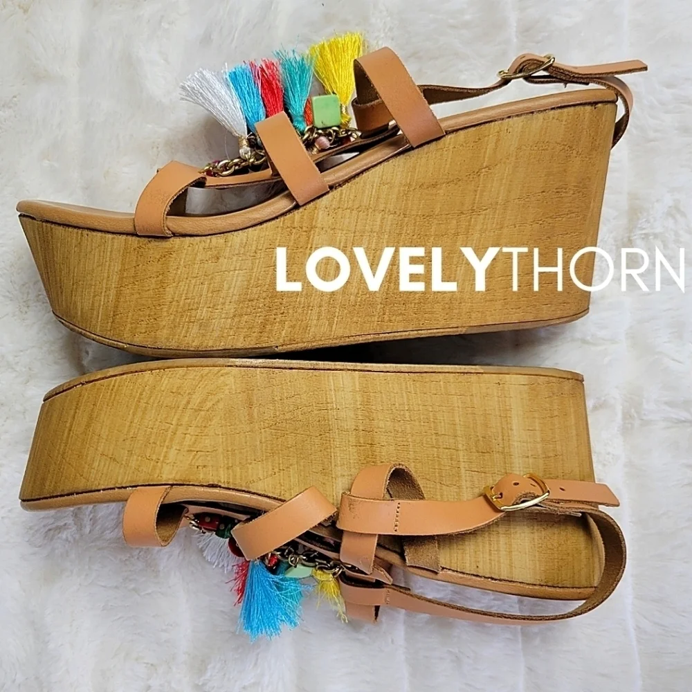 STEVE MADDEN // wooden platform tassel wedge sandals